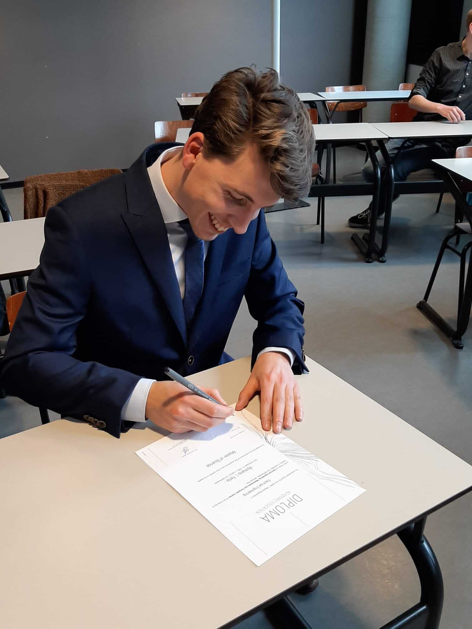 Figure 2: Signing my diploma